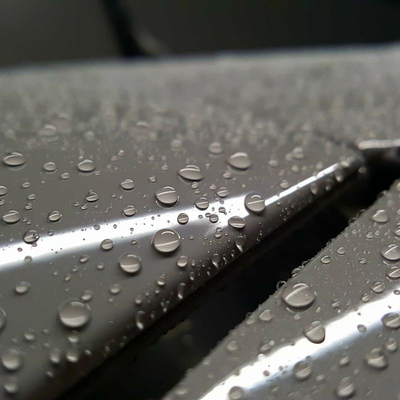 Perfect hydrophobic water beading on car paint protected with Labocosmetica Cupido ceramic spray sealant.